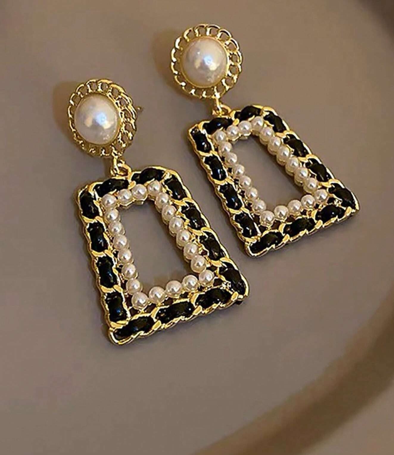 Black and pearl earrings