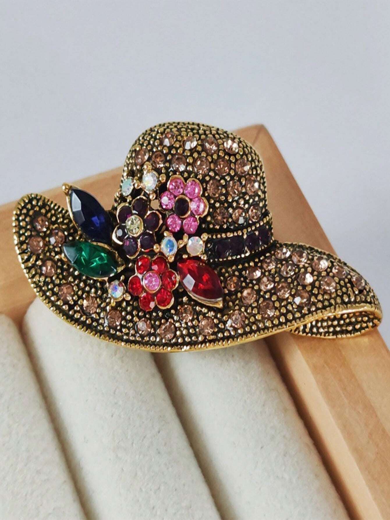 The hat brooch