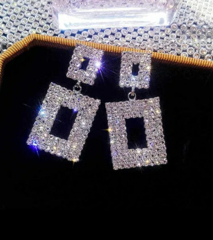 Beautiful rhinestone geometric shaped drop earrings with the blame